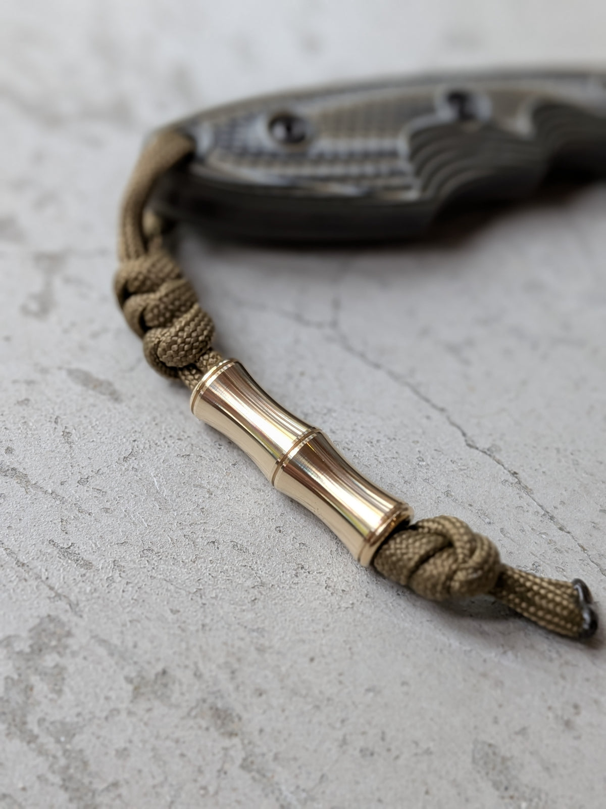 NORA “TAKE” Brass Lanyard Bead