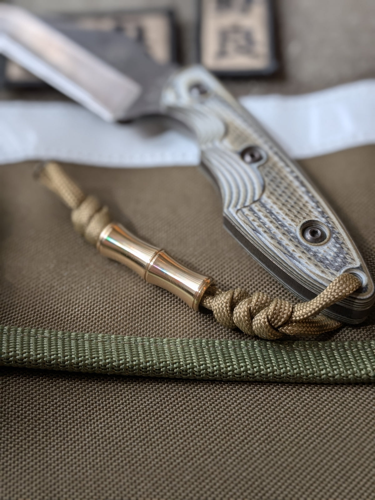 NORA “TAKE” Brass Lanyard Bead