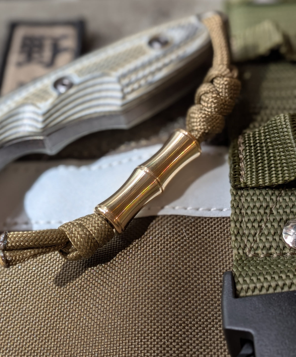 NORA “TAKE” Brass Lanyard Bead